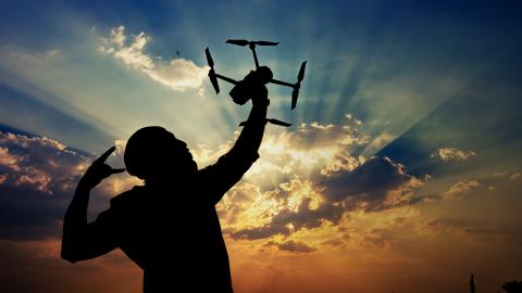 Man with drone in hand